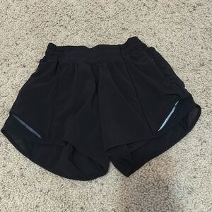 Size 0 4” black hotty hots, perfect condition worn only a handful of times!
